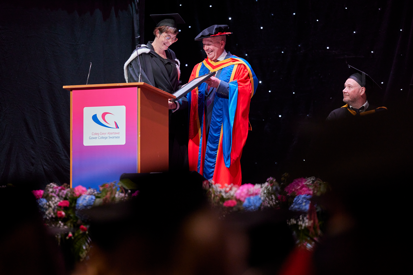 Adele Thomas accepting her Honorary Fellowship certificate