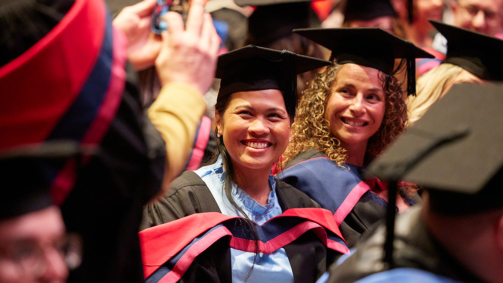 Graduation student in grad hat