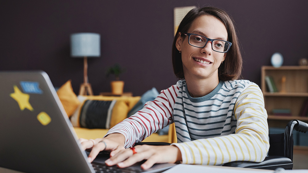 Wheelchair user at computer