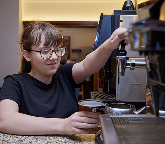 ILS student learning how to become a barista