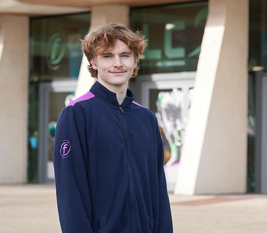 ILS student standing outside LC2