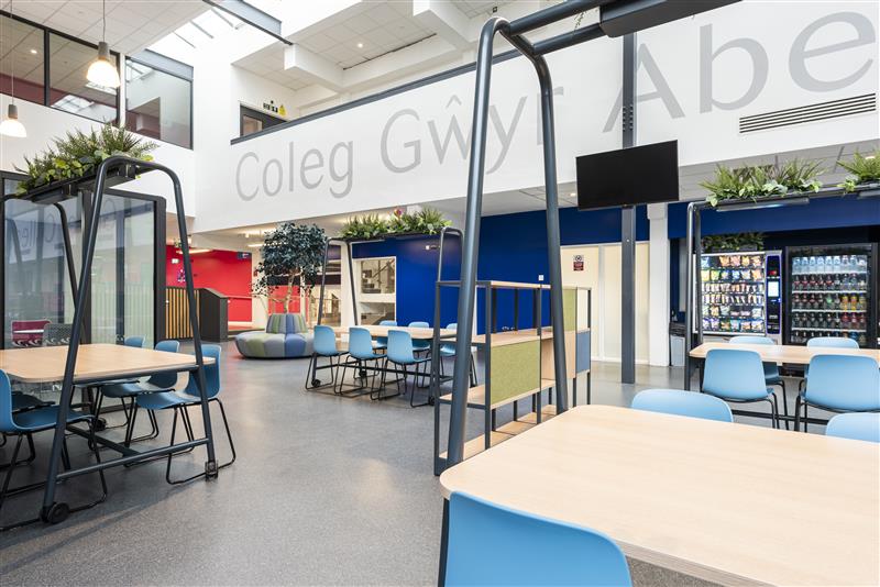 Photo of the atrium featuring seating areas and plants