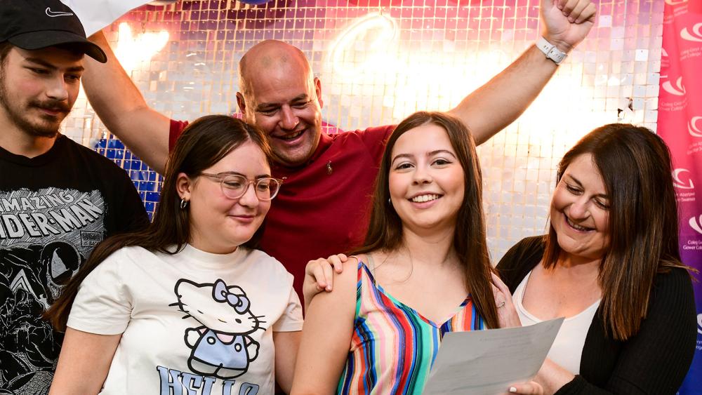 Student on A Level results day celebrating with family