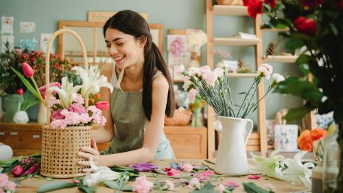 Woman arranging flowers