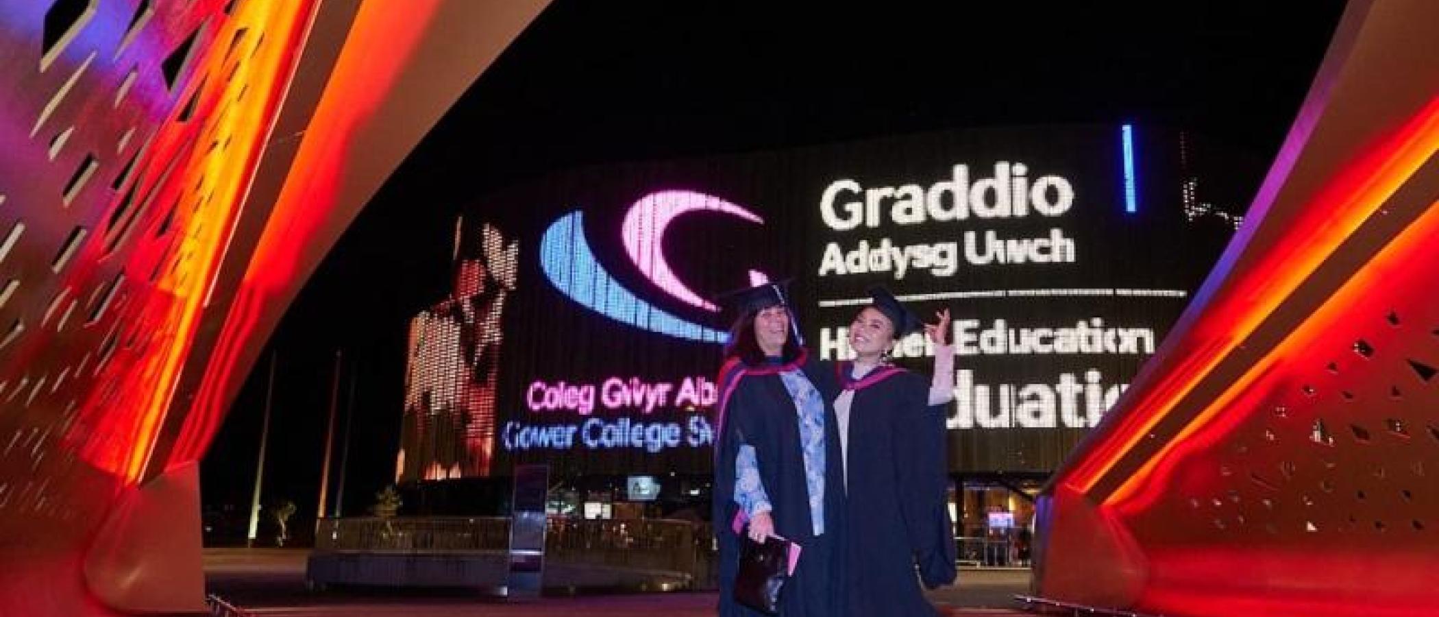 Students standing outside Swansea Arena 