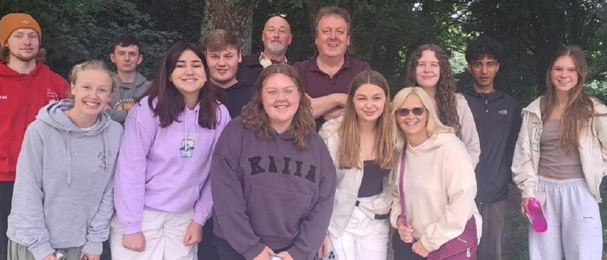 Staff and students on the way to the airport