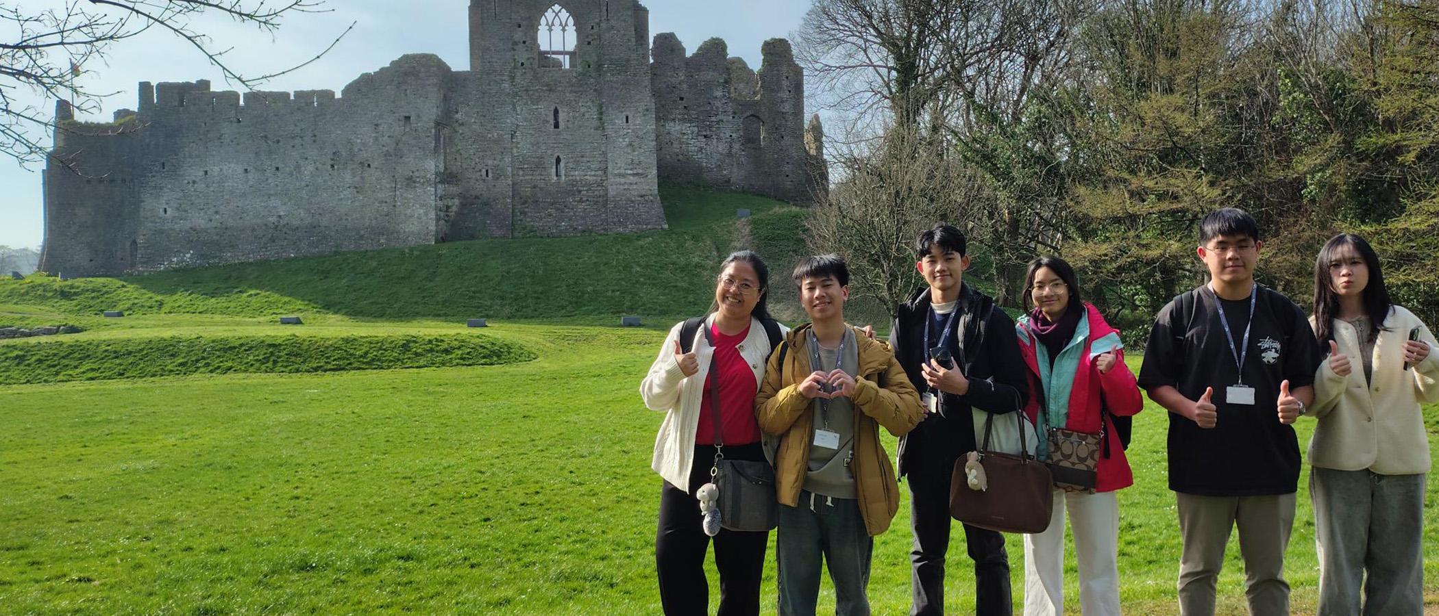 Group of international students at Oystermouth castle