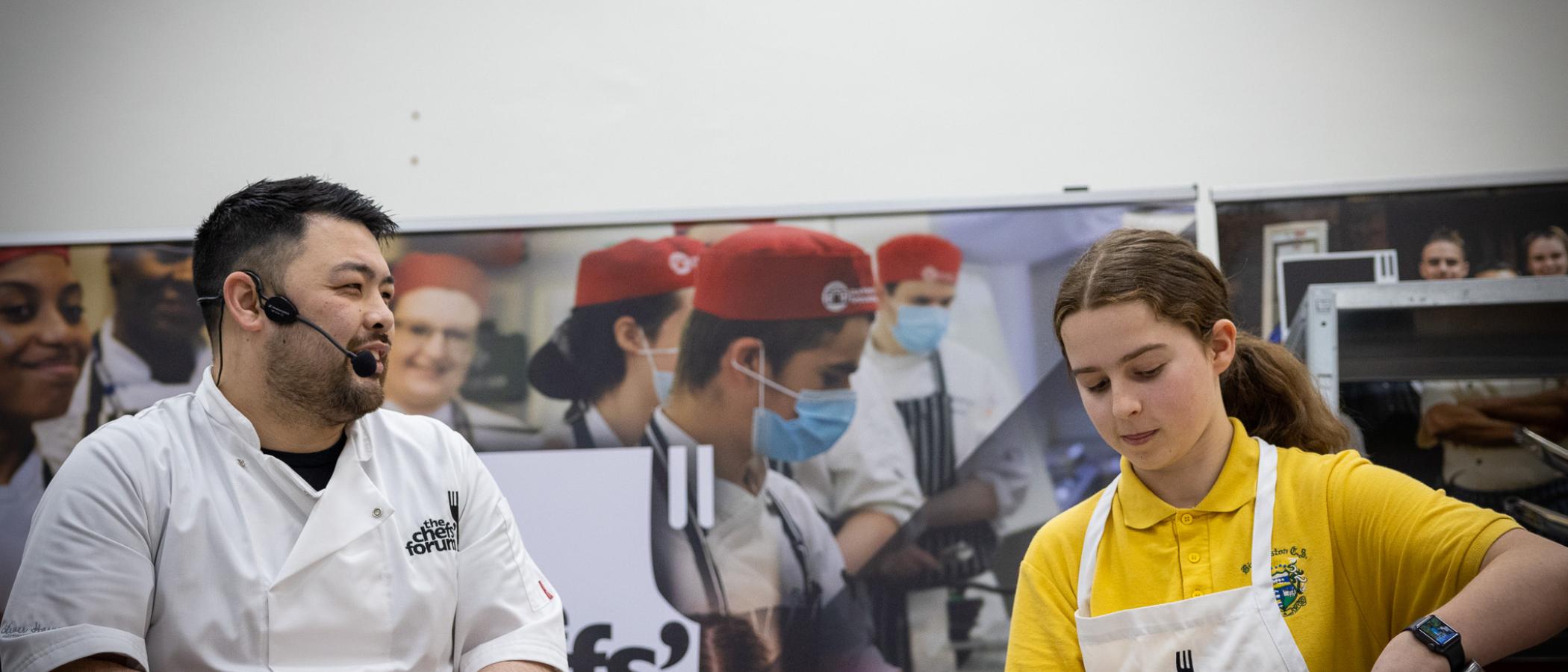 Masterchef Professionals Chef Leon Lewis and school pupil cooking
