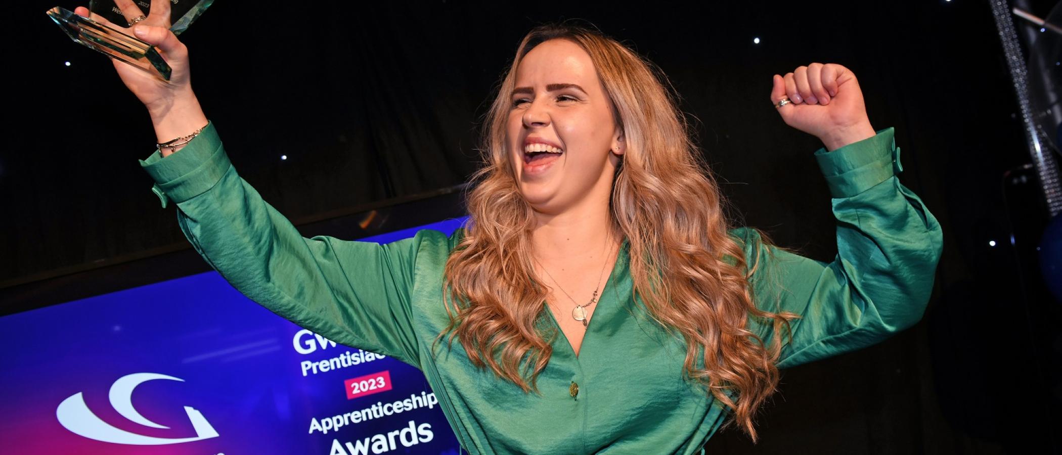 Winner collecting award