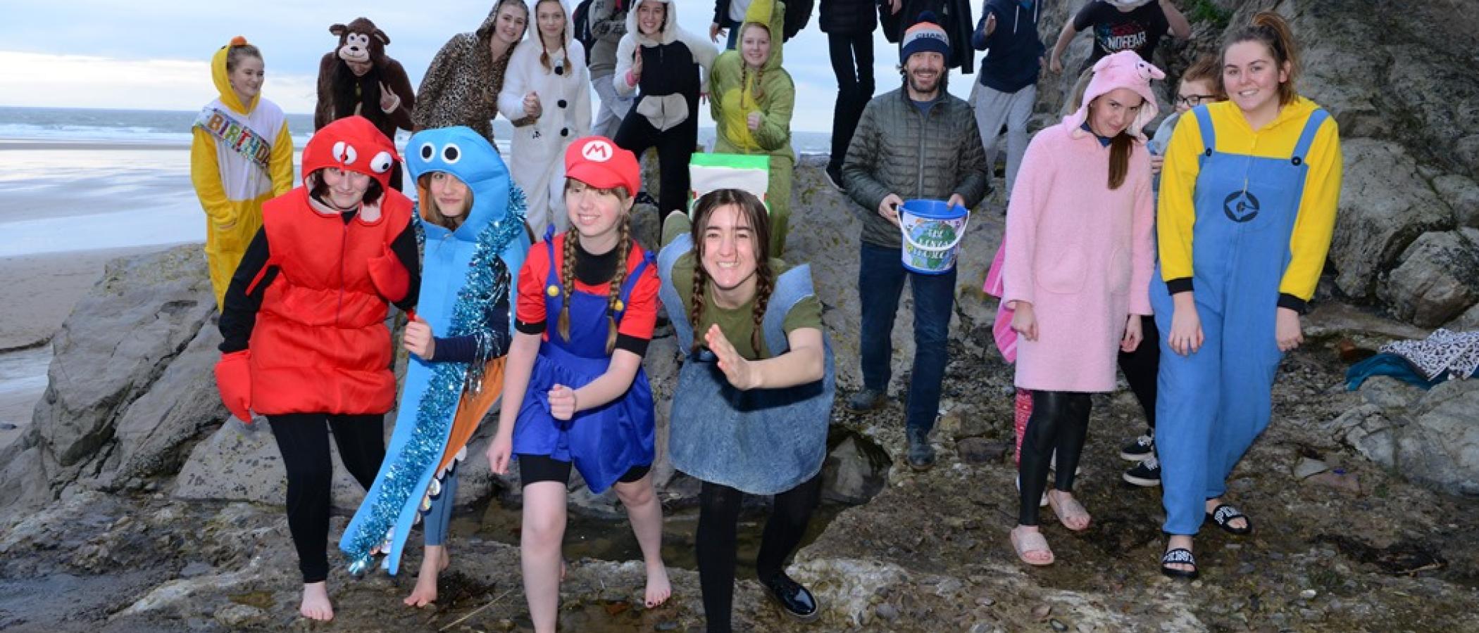 A splash in the sea for charity - students take a walrus dip