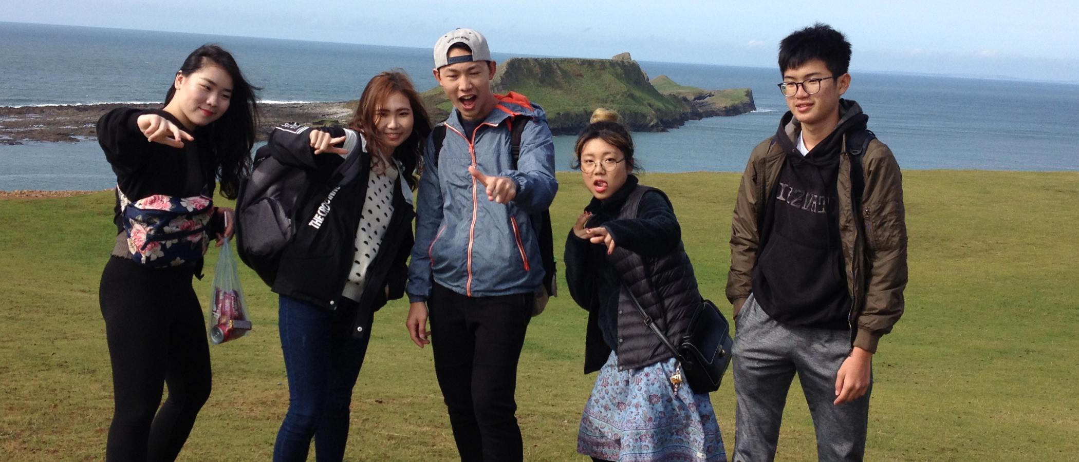 International students enjoy a day out at Rhossili Bay