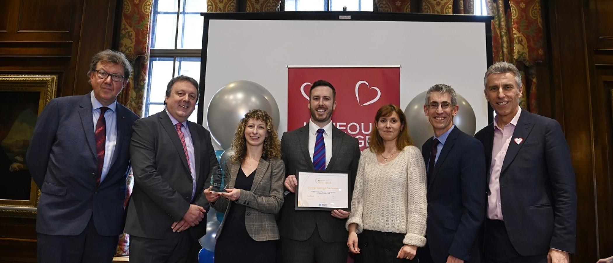 Gower College Swansea staff with their winning Beacon Award