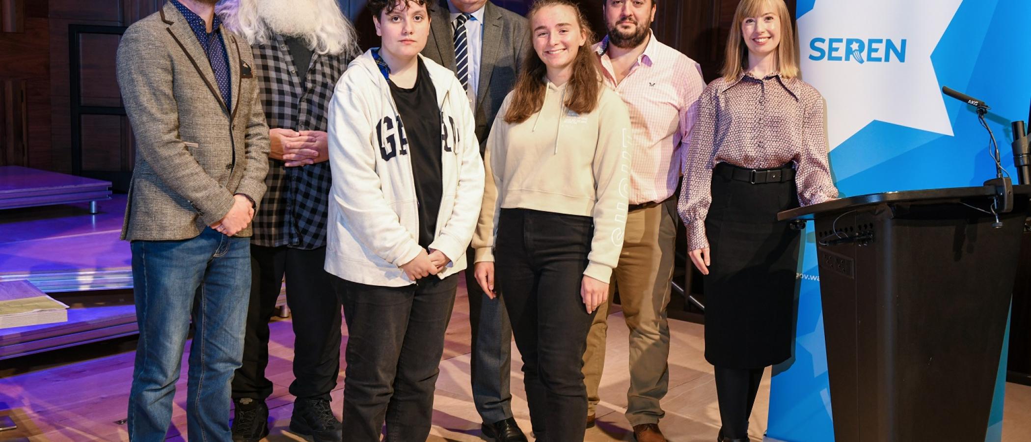 Group standing on stage