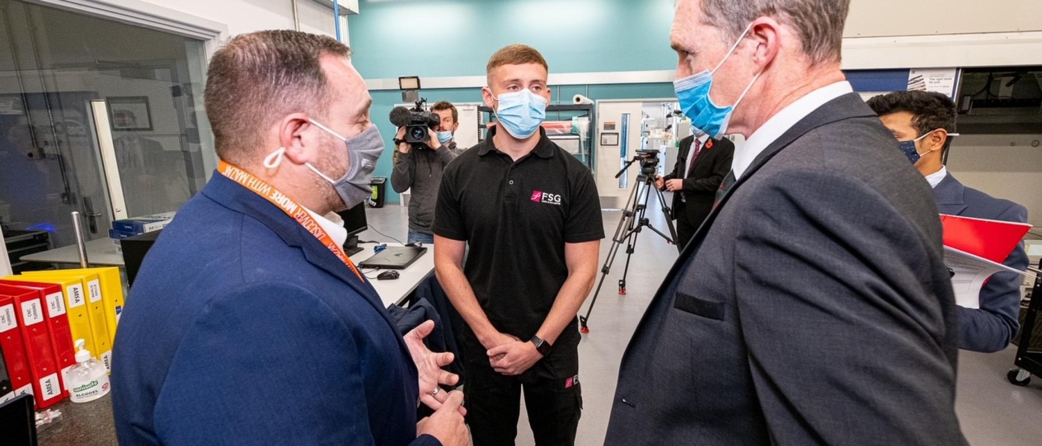 Minister David TC Davies speaking to FSG apprentice studying at University of Wales Trinity St. David.