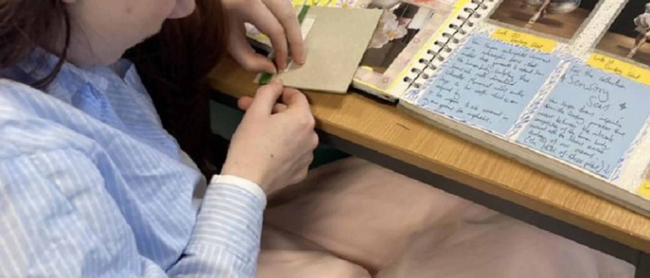 Student cutting in textiles