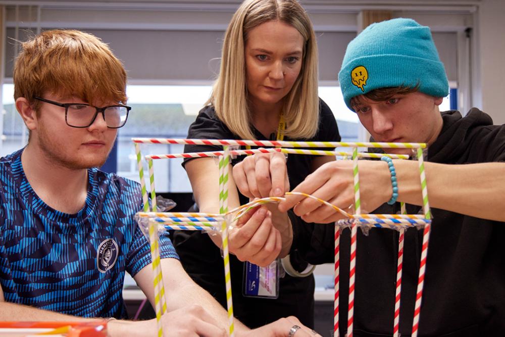 Students building with straws