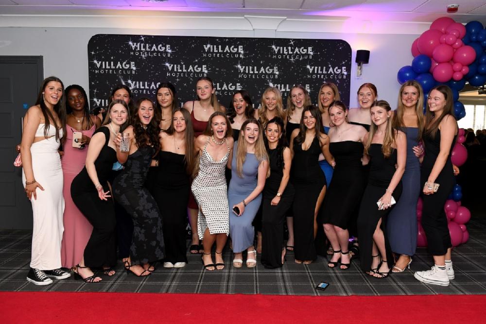 Group of students in formal party dress