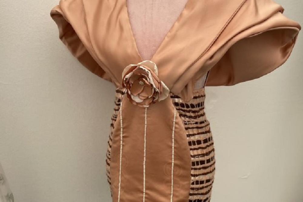 Costumes on display on stage at URDD Eisteddfod