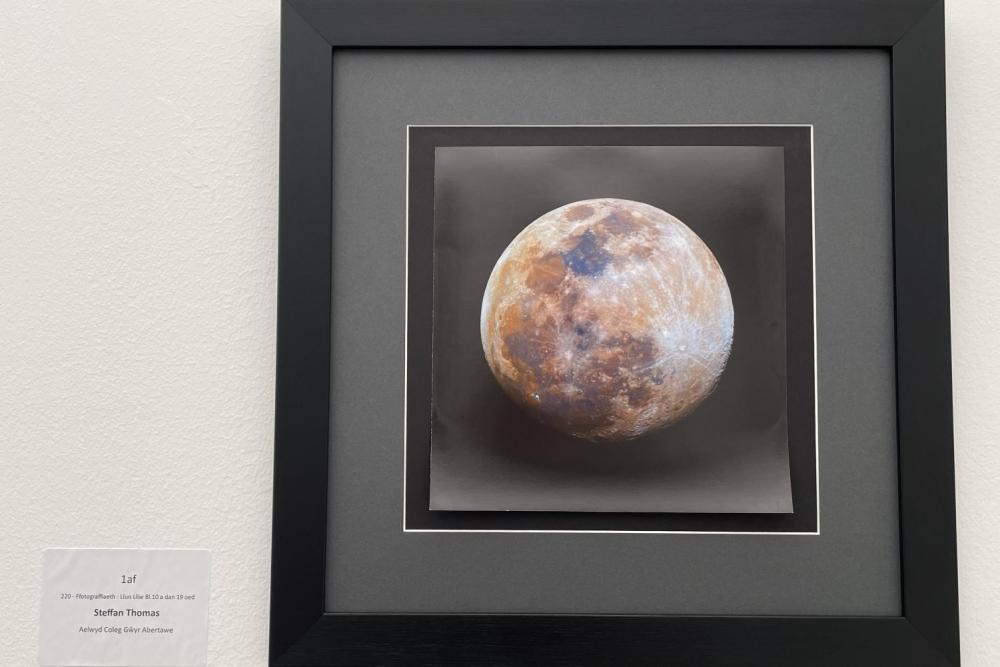 Costumes on display on stage at URDD Eisteddfod