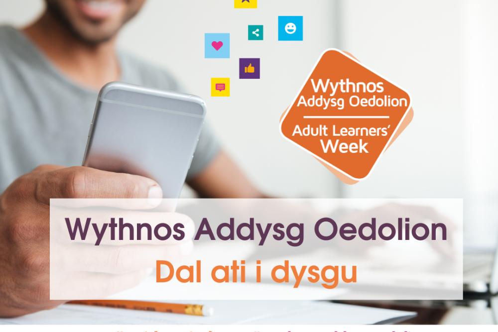 Graffeg "Wythnos Addysg Oedolion - Peidiwch byth â rhoi'r gorau i ddysgu" yn cynnwys person yn gwenu ar eu ffôn, logos yr ALW a'r logos cysylltiedig (Llywodraeth Cymru, Sefydliad Dysgu a Gwaith, Gyrfa Cymru a Cymru'n Gweithio), a hashnodau #paidstopiodysgu ac #wythnosaddysgoedolion