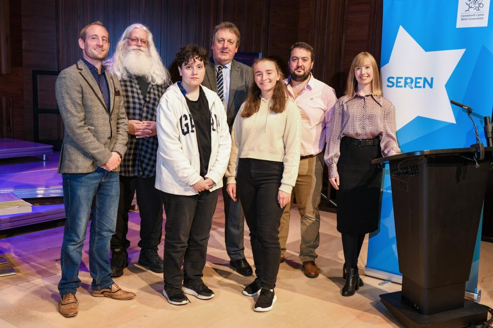 Group standing on stage