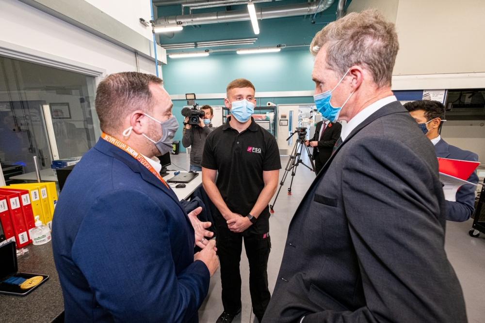 Minister David TC Davies speaking to FSG apprentice studying at University of Wales Trinity St. David.