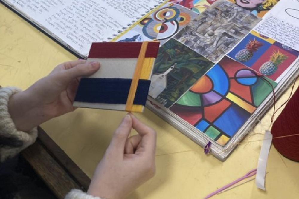 Student cutting in textiles