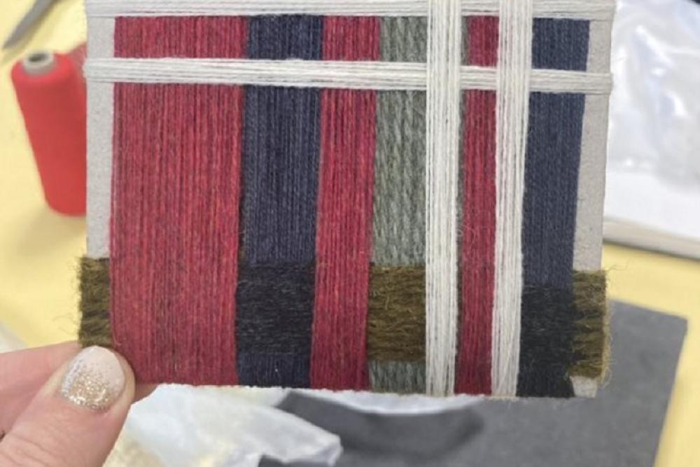 Student cutting in textiles