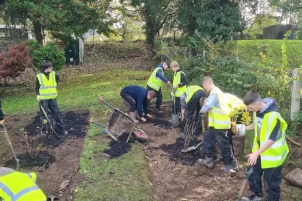 Welsh students with Adam yn yr Ardd